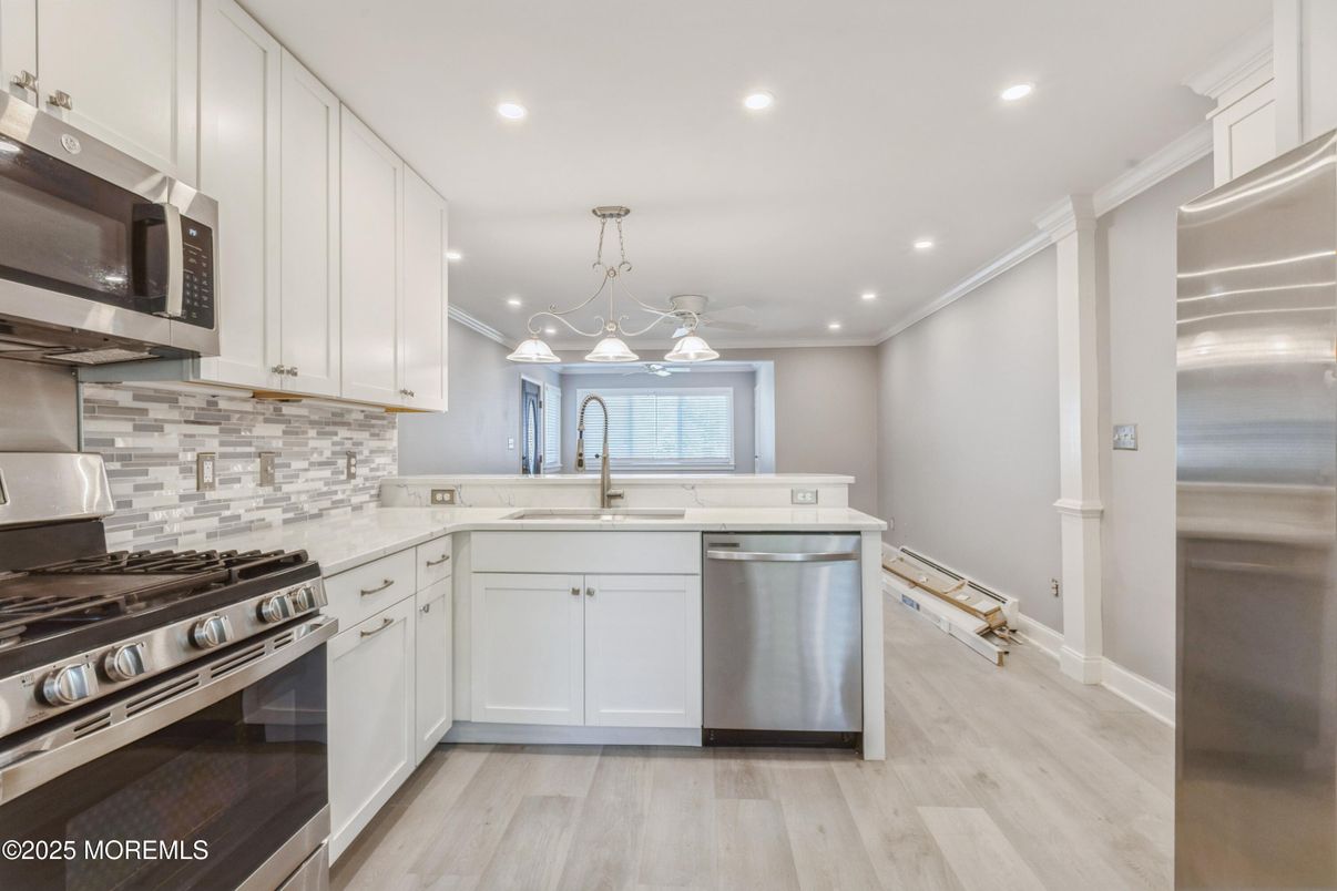 Interior, Kitchen, Pendant Lights, Recessed Lighting, Stainless Steel Appliances, Wood Texture Flooring