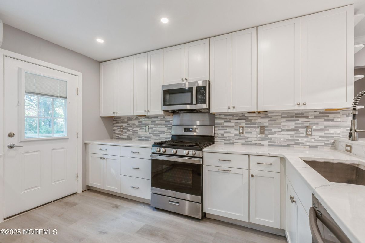 Interior, Kitchen, Recessed Lighting, Stainless Steel Appliances, Wood Texture Flooring