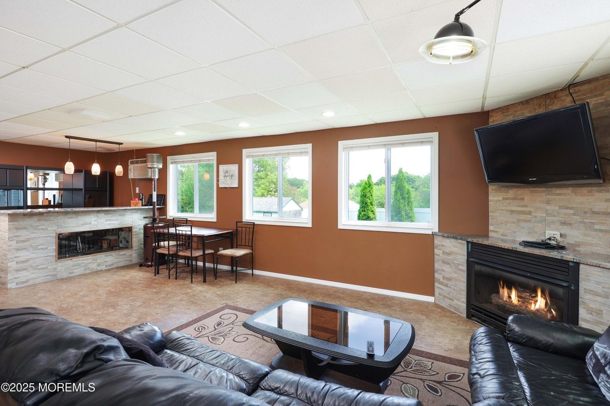 Dining room, Fireplace, Interior, Living room, Pendant Lights, Recessed Lighting, Stone Walls