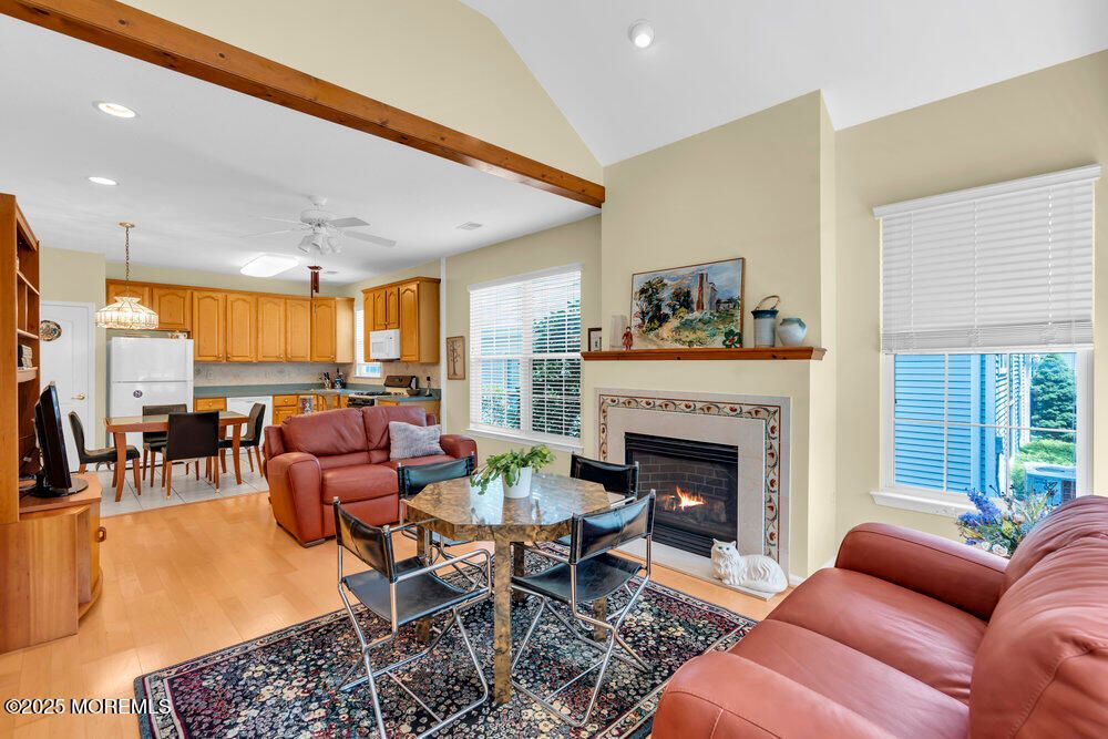 Dining room, Fireplace, Interior, Living room, Pendant Lights, Recessed Lighting, Wooden Beams, Wood Texture Flooring
