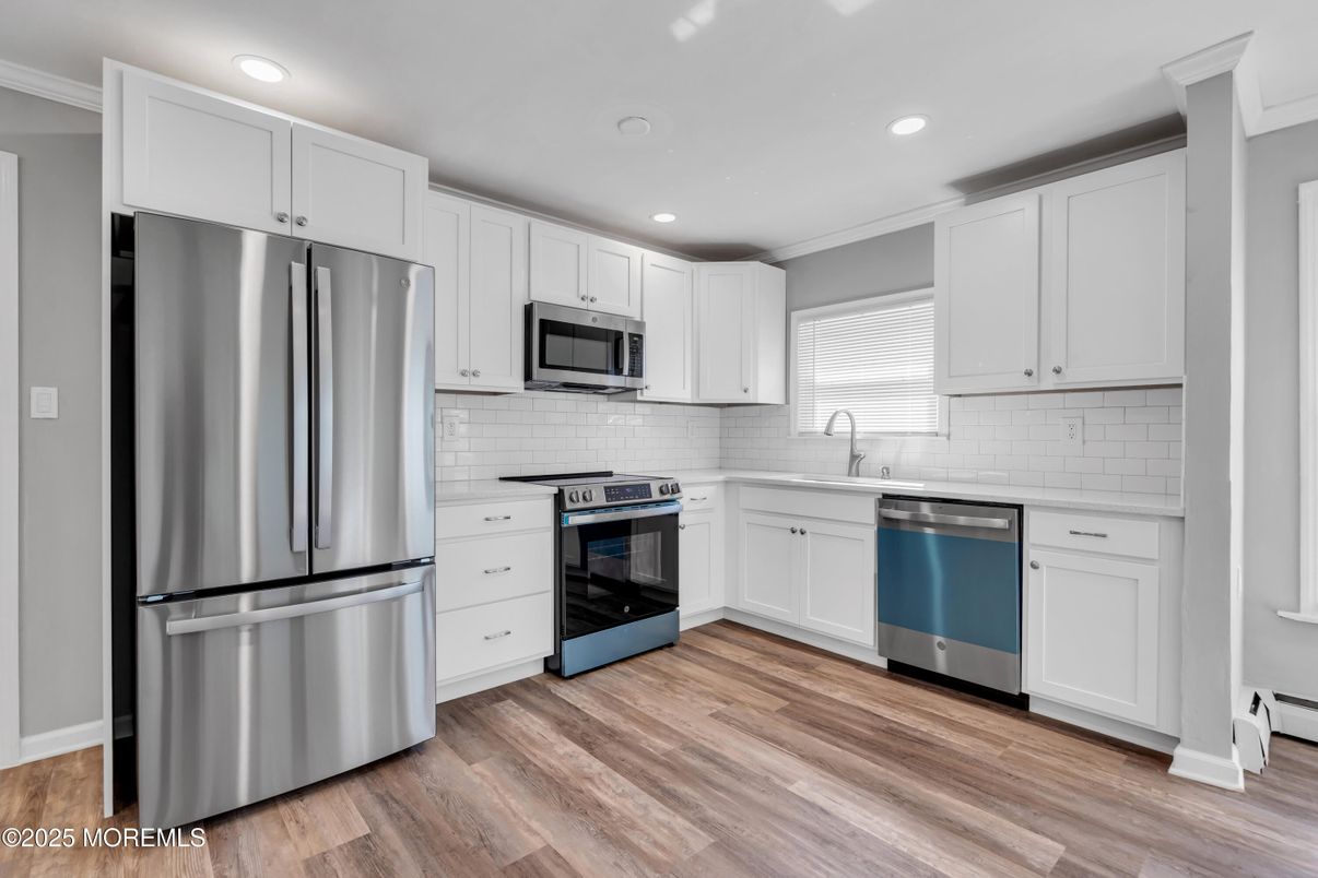 Interior, Kitchen, Recessed Lighting, Stainless Steel Appliances, Wood Texture Flooring