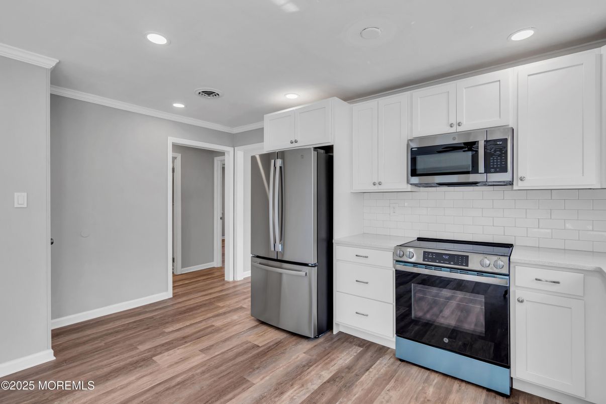 Interior, Kitchen, Recessed Lighting, Stainless Steel Appliances, Wood Texture Flooring