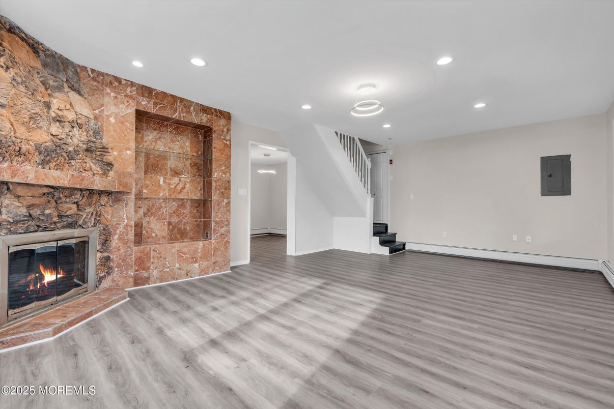 Empty room, Fireplace, Interior, Recessed Lighting, Wood Texture Flooring