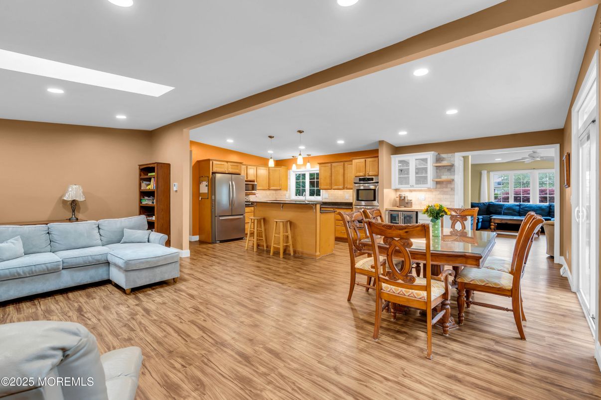 Dining room, Interior, Kitchen, Living room, Pendant Lights, Recessed Lighting, Stainless Steel Appliances, Wood Texture Flooring