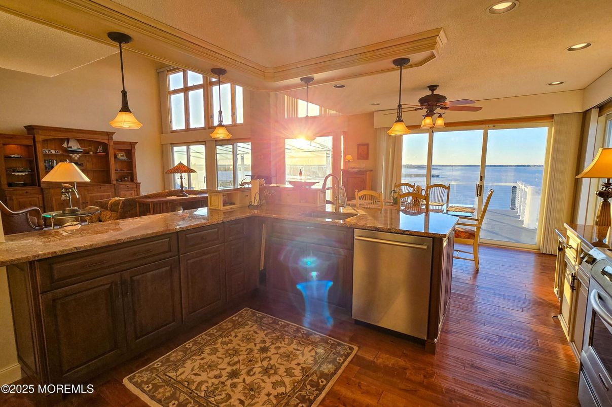 Dining room, Interior, Kitchen, Pendant Lights, Recessed Lighting, Water, Wood Texture Flooring