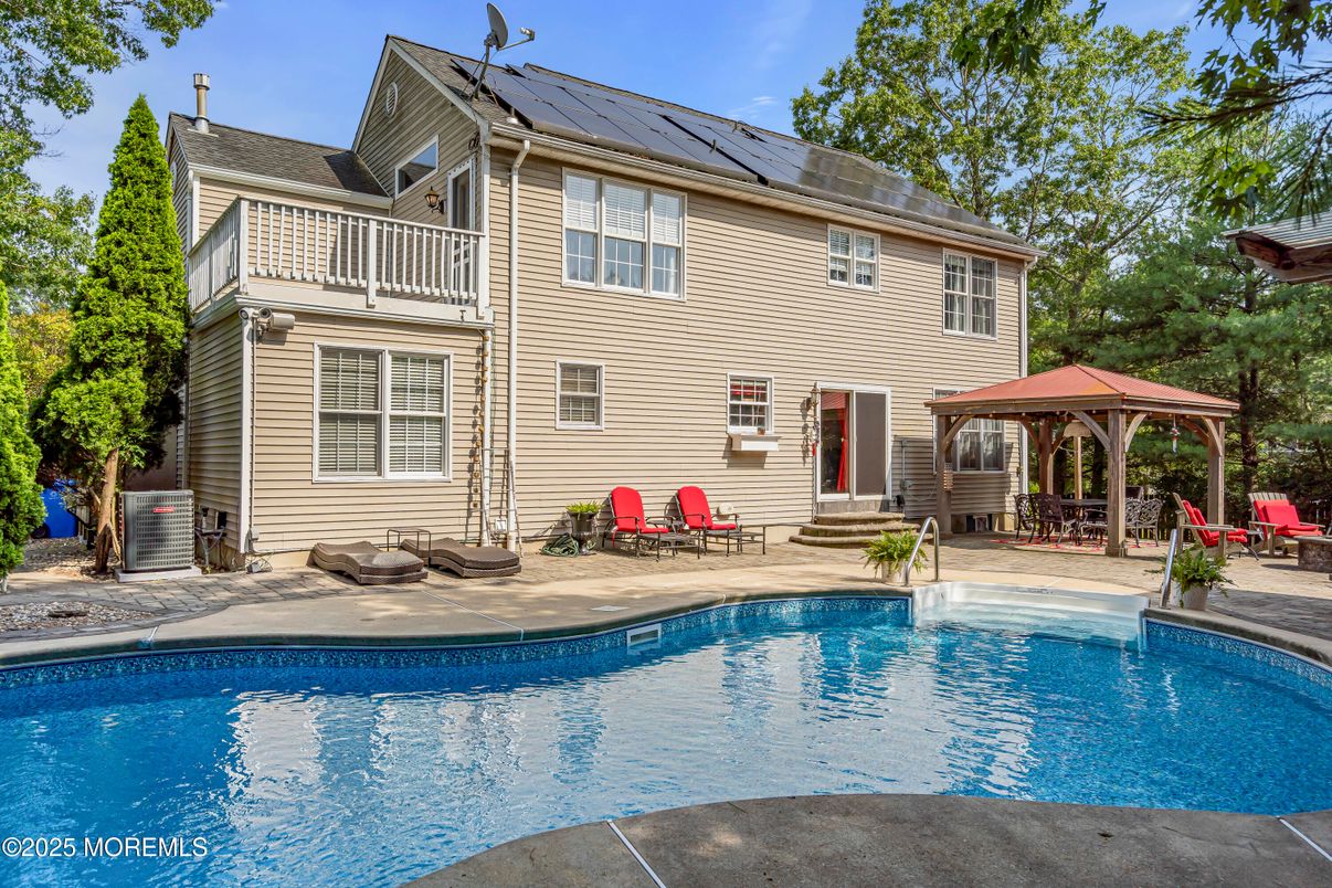 Exterior, Pool, Solar Panels