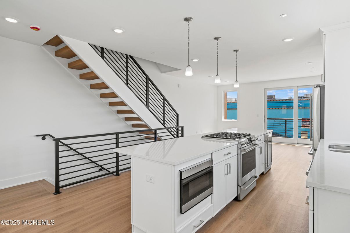 Interior, Kitchen, Pendant Lights, Recessed Lighting, Stainless Steel Appliances, Water, Wood Texture Flooring