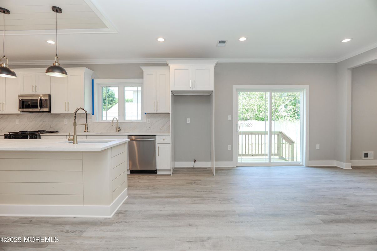 Interior, Kitchen, Pendant Lights, Recessed Lighting, Stainless Steel Appliances, Wood Texture Flooring