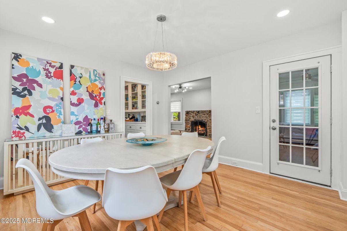 Dining room, Fireplace, Interior, Pendant Lights, Recessed Lighting, Wood Texture Flooring