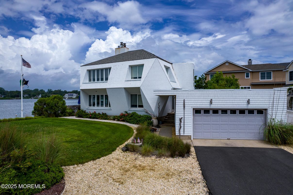 Attached, Exterior, Facade, Water, Raised Ranch