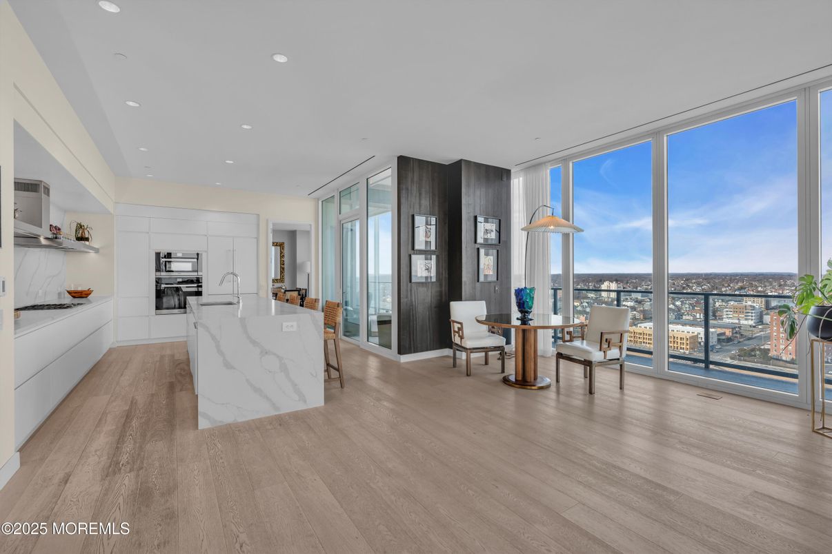 Dining room, Interior, Kitchen, Recessed Lighting, Stainless Steel Appliances, Wood Texture Flooring