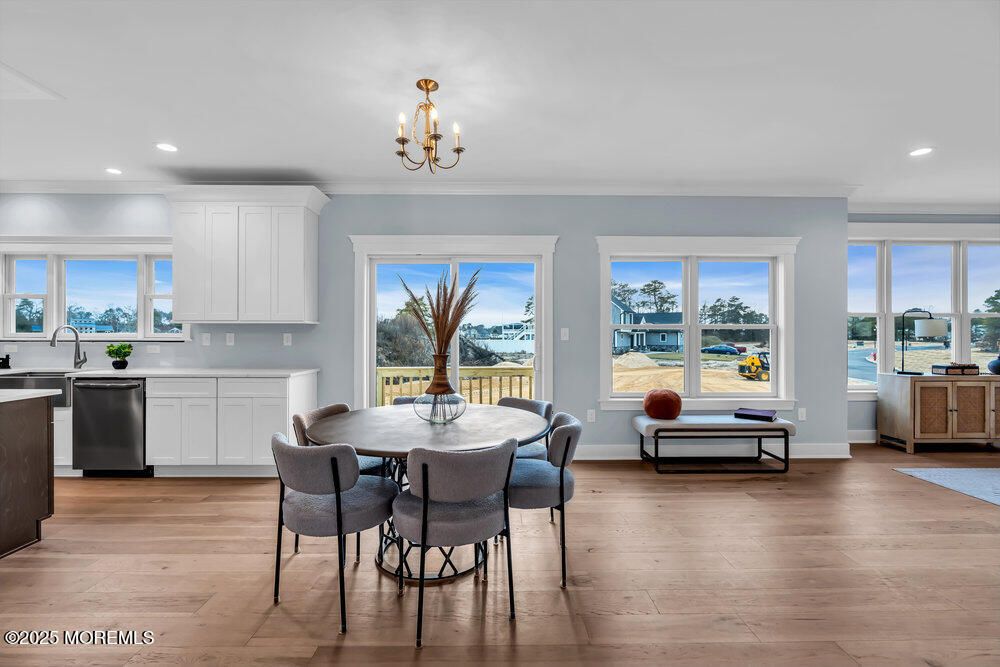 Chandelier, Dining room, Interior, Kitchen, Recessed Lighting, Water, Wood Texture Flooring