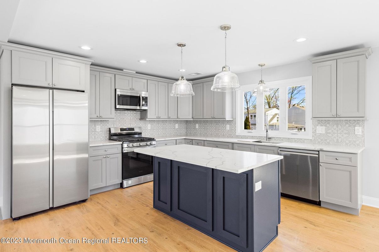 Interior, Kitchen, Pendant Lights, Recessed Lighting, Stainless Steel Appliances, Wood Texture Flooring