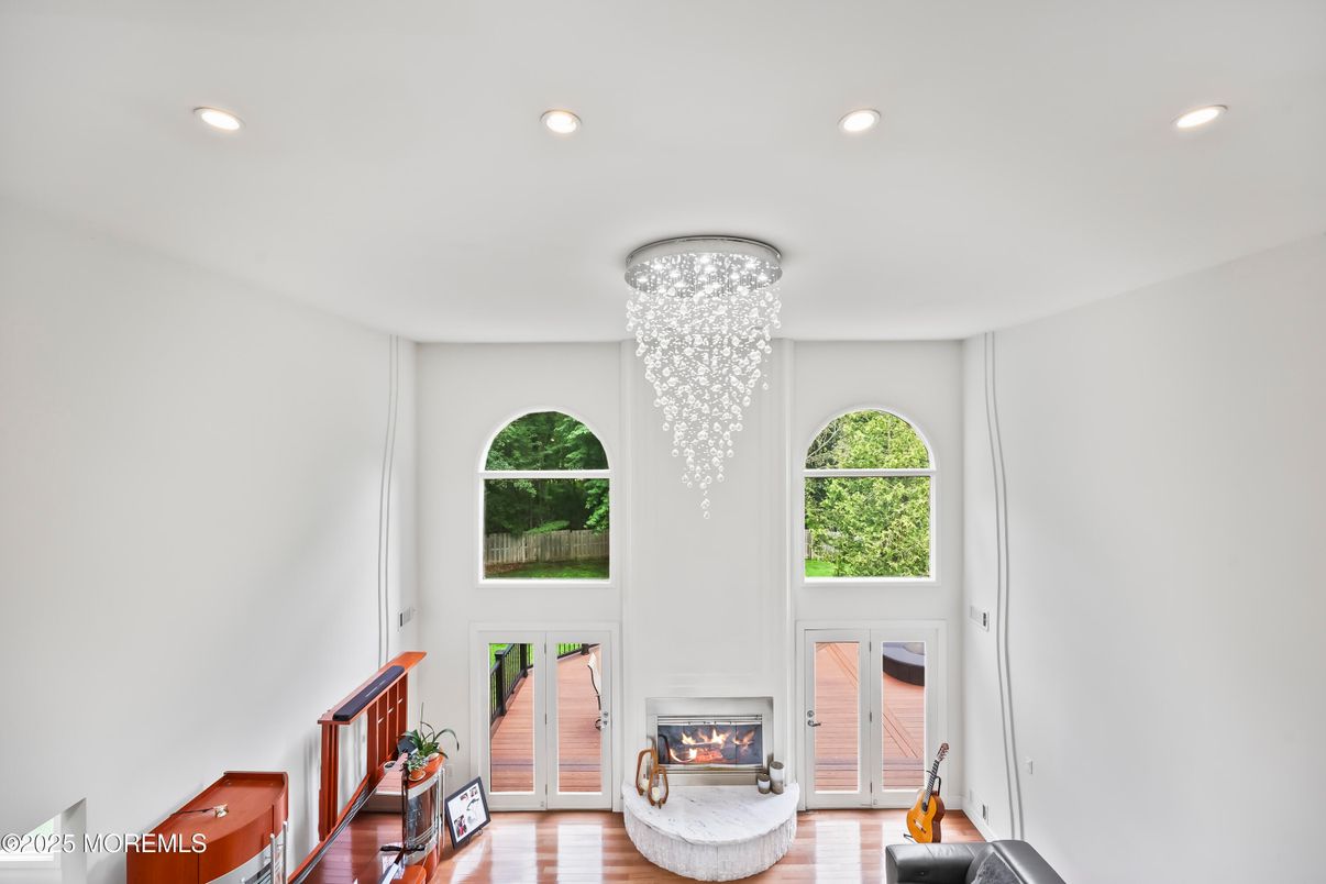 Chandelier, Fireplace, Interior, Recessed Lighting, Wood Texture Flooring