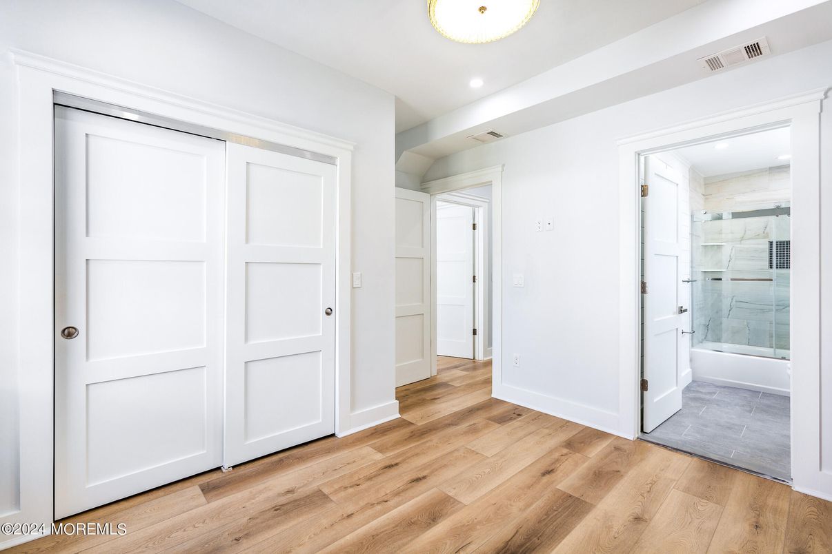 Bathroom, Empty room, Glass Shower, Interior, Recessed Lighting, Wood Texture Flooring