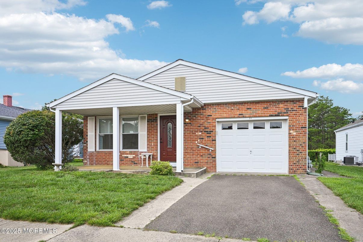 Attached, Exterior, Facade, Brick Facade, Brick Traditional
