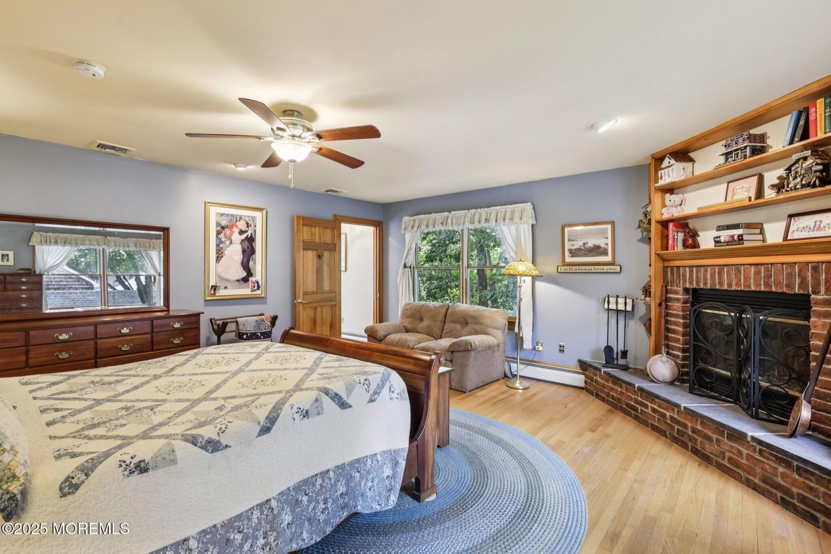 Bedroom, Fireplace, Interior, Recessed Lighting, Wood Texture Flooring