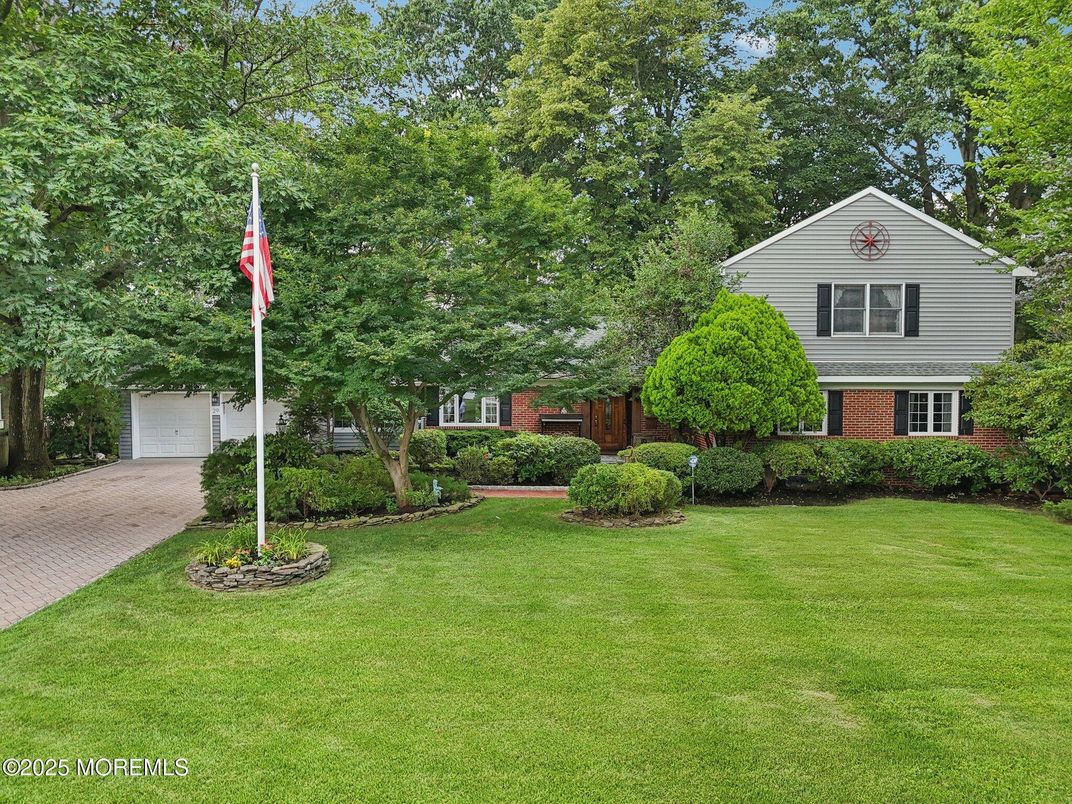 Attached, Detached Garage, Exterior, Facade, Brick Facade, Raised Ranch