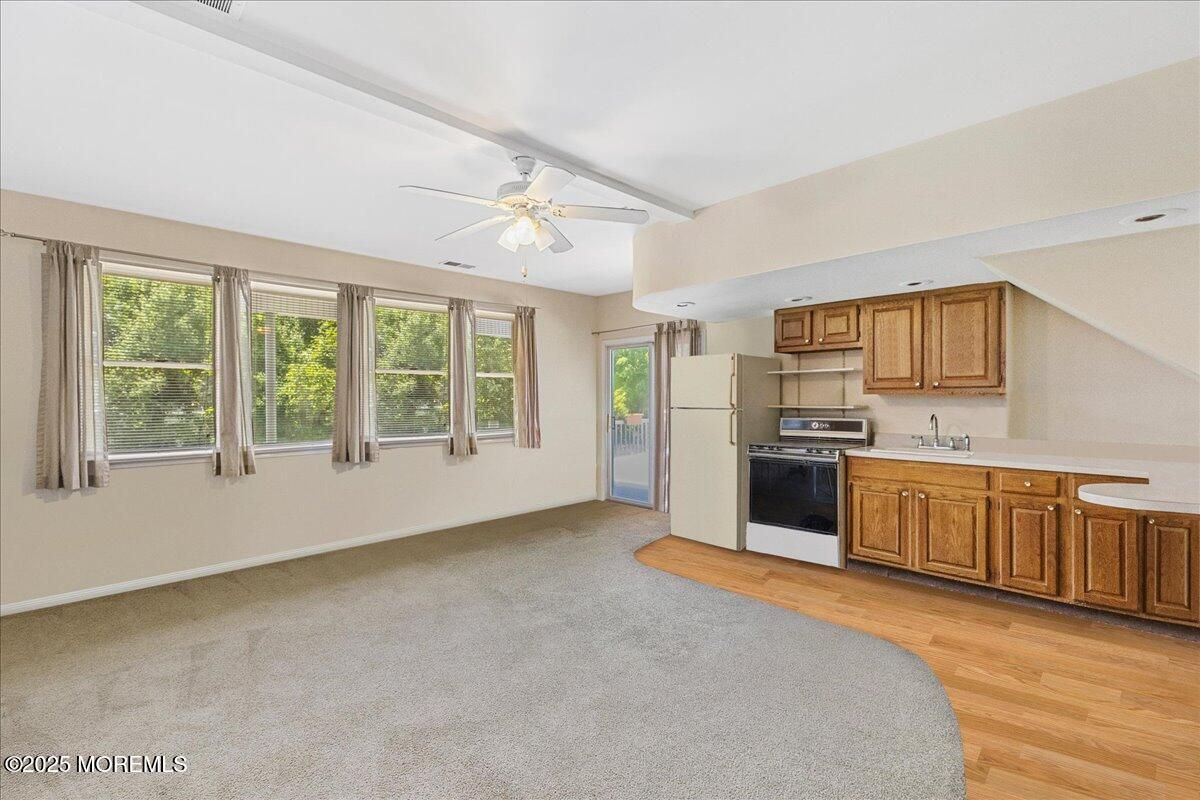 Empty room, Interior, Kitchen, Stainless Steel Appliances, Wood Texture Flooring