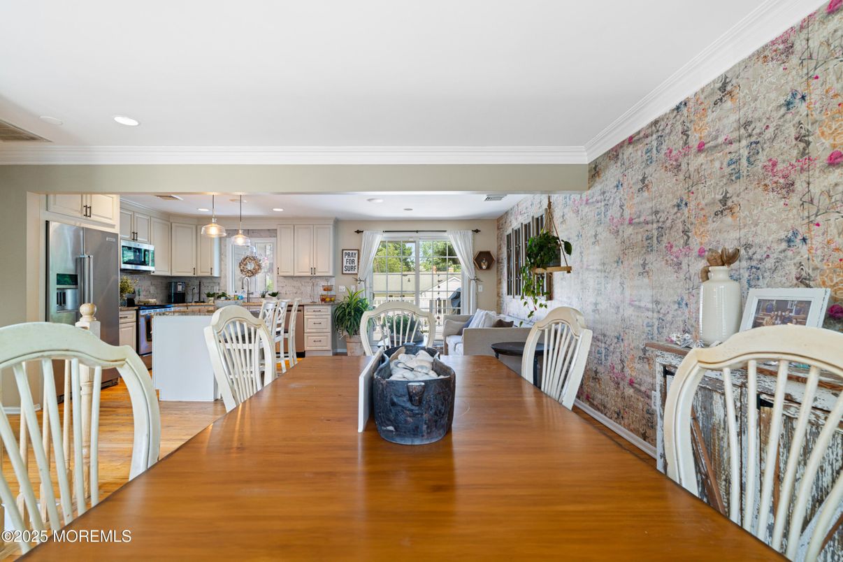 Dining room, Interior, Kitchen, Pendant Lights, Recessed Lighting, Stainless Steel Appliances, Wood Texture Flooring