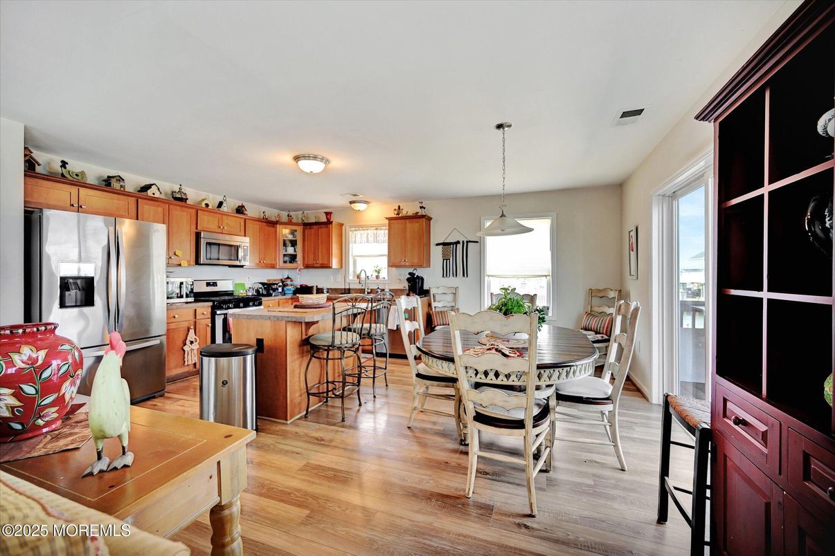 Dining room, Interior, Kitchen, Pendant Lights, Stainless Steel Appliances, Wood Texture Flooring