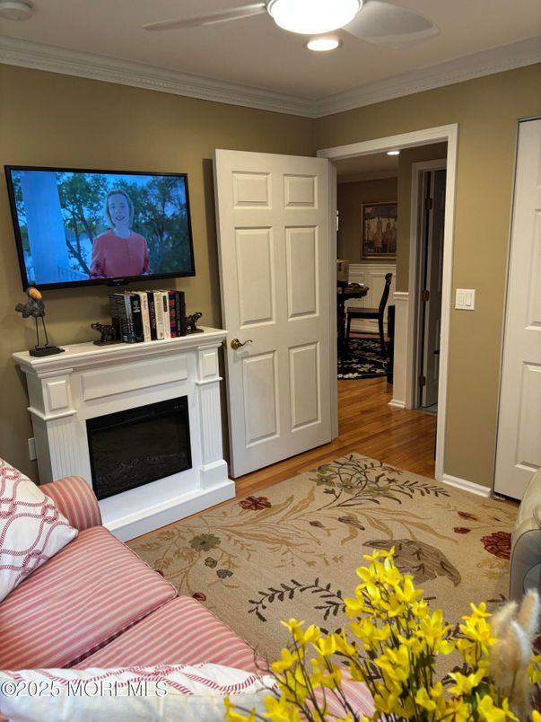 Bedroom, Fireplace, Interior, Recessed Lighting, Wood Texture Flooring