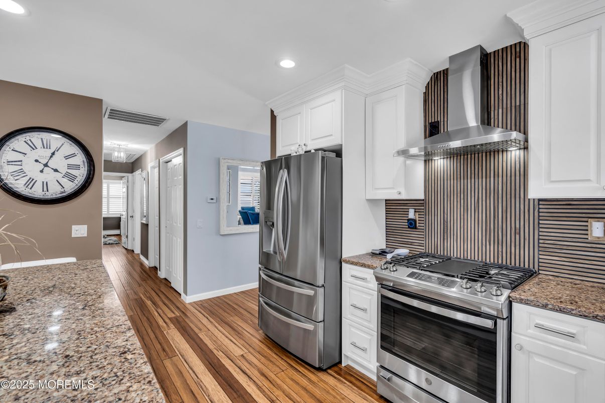Interior, Kitchen, Recessed Lighting, Stainless Steel Appliances, Wood Texture Flooring