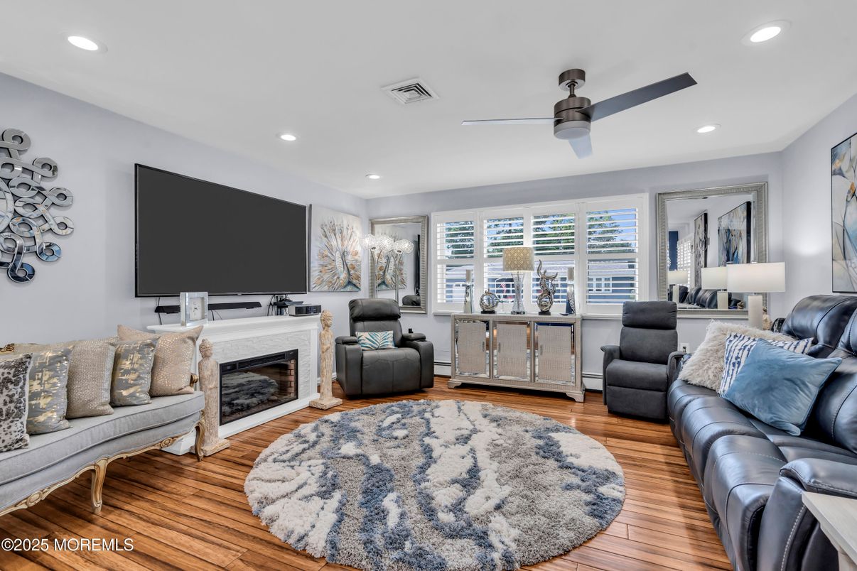 Fireplace, Interior, Living room, Recessed Lighting, Wood Texture Flooring