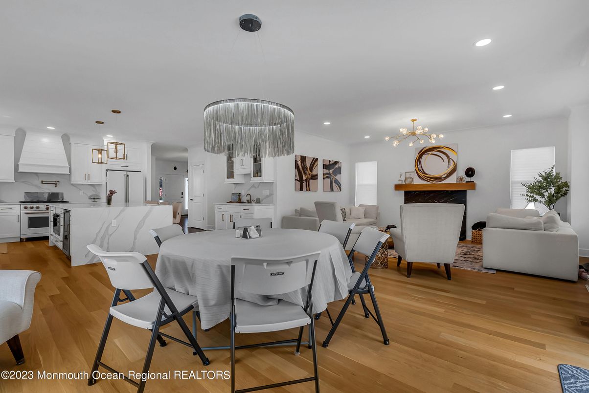 Chandelier, Dining room, Interior, Kitchen, Living room, Pendant Lights, Recessed Lighting, Wood Texture Flooring