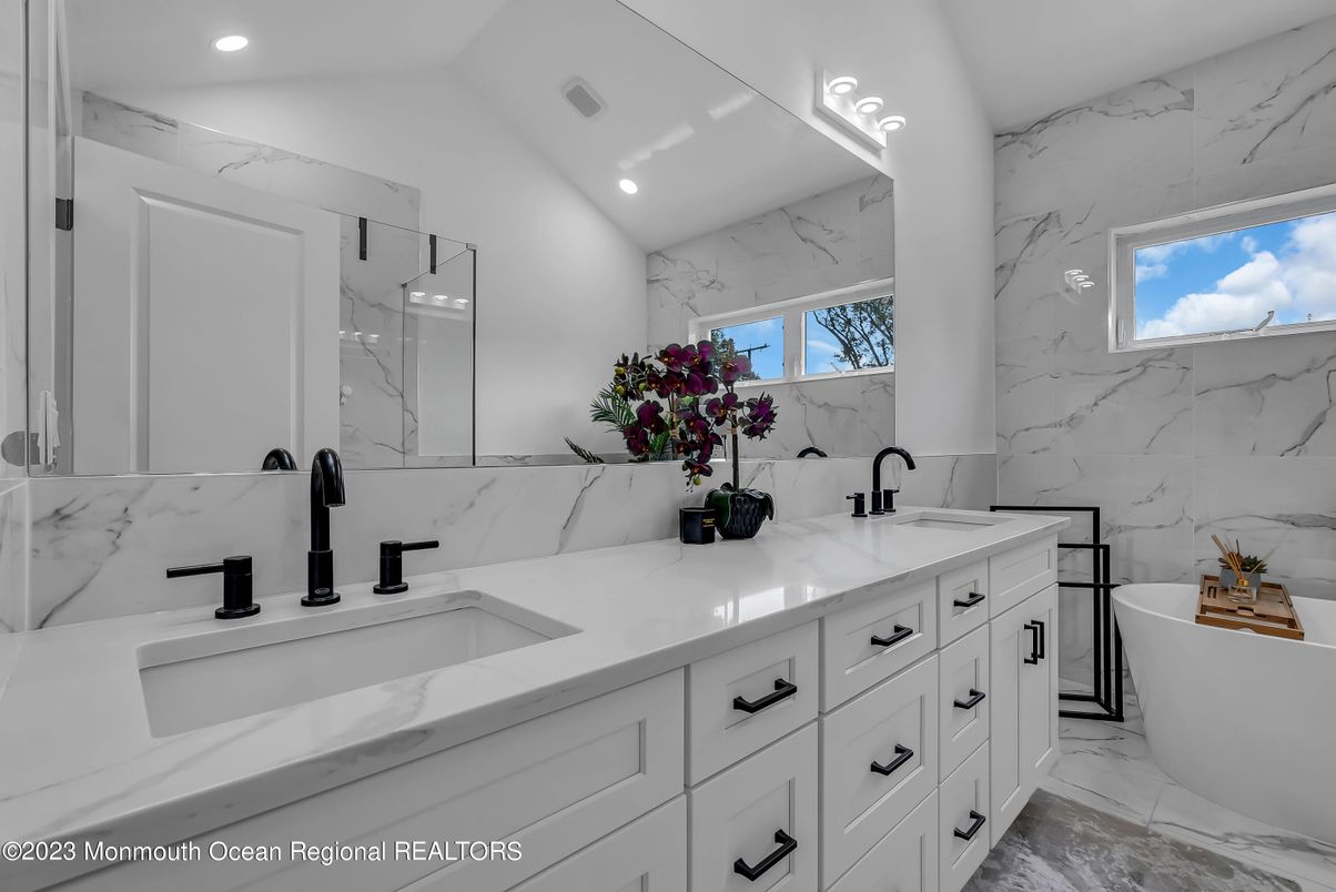 Bathroom, Dual Sink Vanities, Free Standing Baths, Interior, Marble, Marble Walls, Recessed Lighting