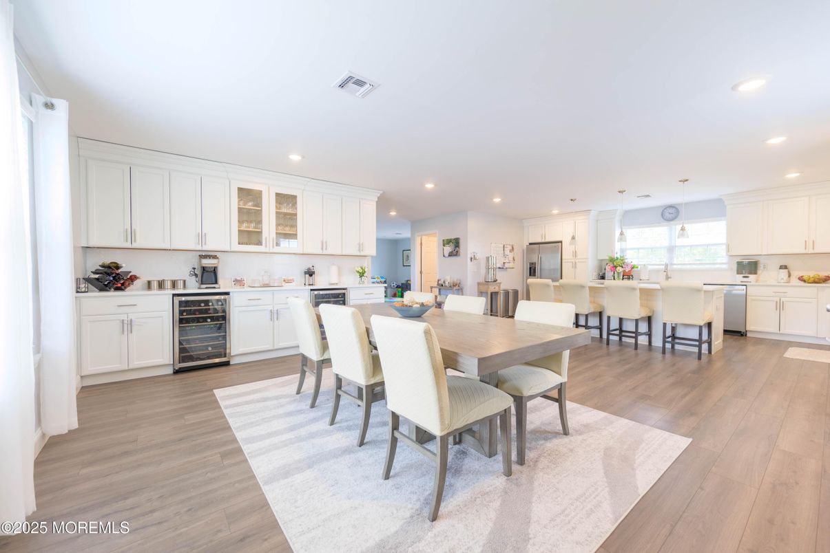 Dining room, Interior, Kitchen, Pendant Lights, Recessed Lighting, Stainless Steel Appliances, Wood Texture Flooring