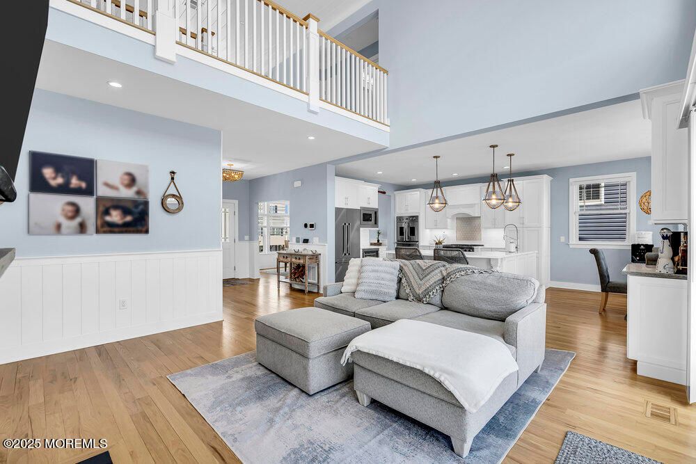 Dining room, Interior, Kitchen, Living room, Pendant Lights, Recessed Lighting, Stainless Steel Appliances, Wood Texture Flooring