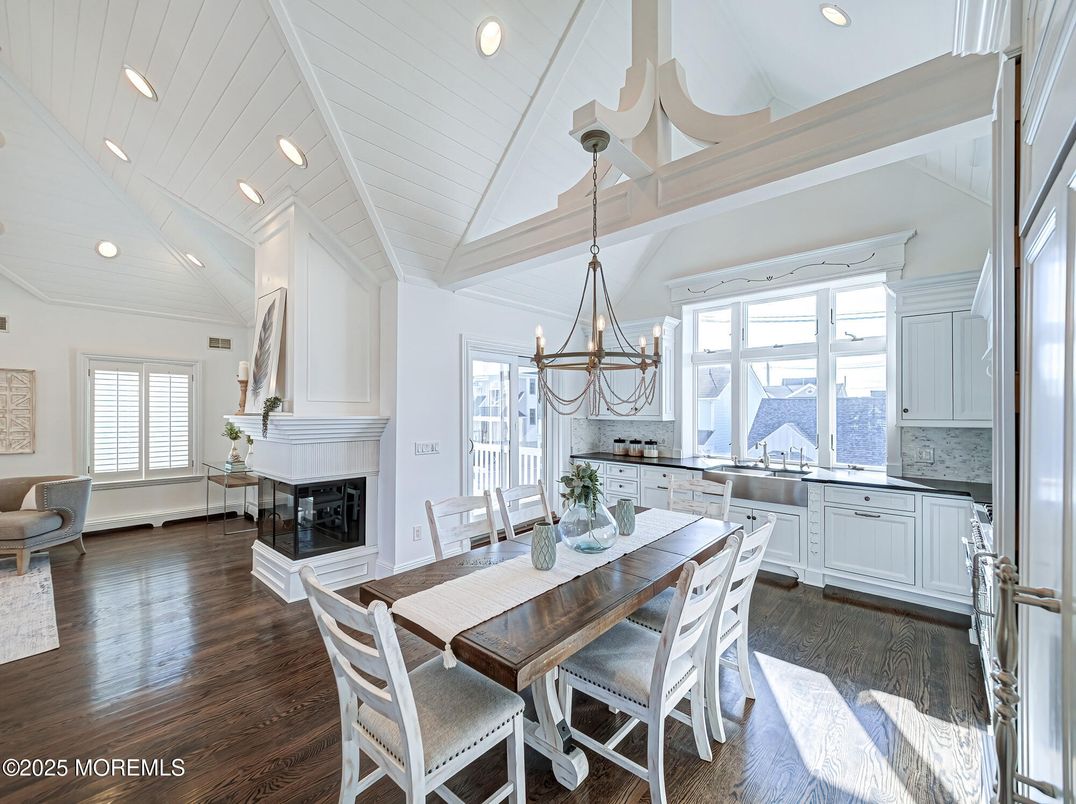 Chandelier, Dining room, Fireplace, Interior, Kitchen, Pendant Lights, Recessed Lighting, Wood Texture Flooring