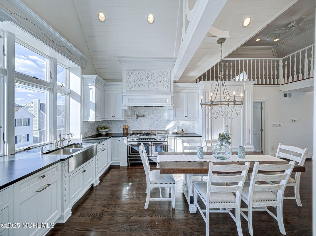 Dining room, Interior, Kitchen, Pendant Lights, Recessed Lighting, Stainless Steel Appliances, Wood Texture Flooring