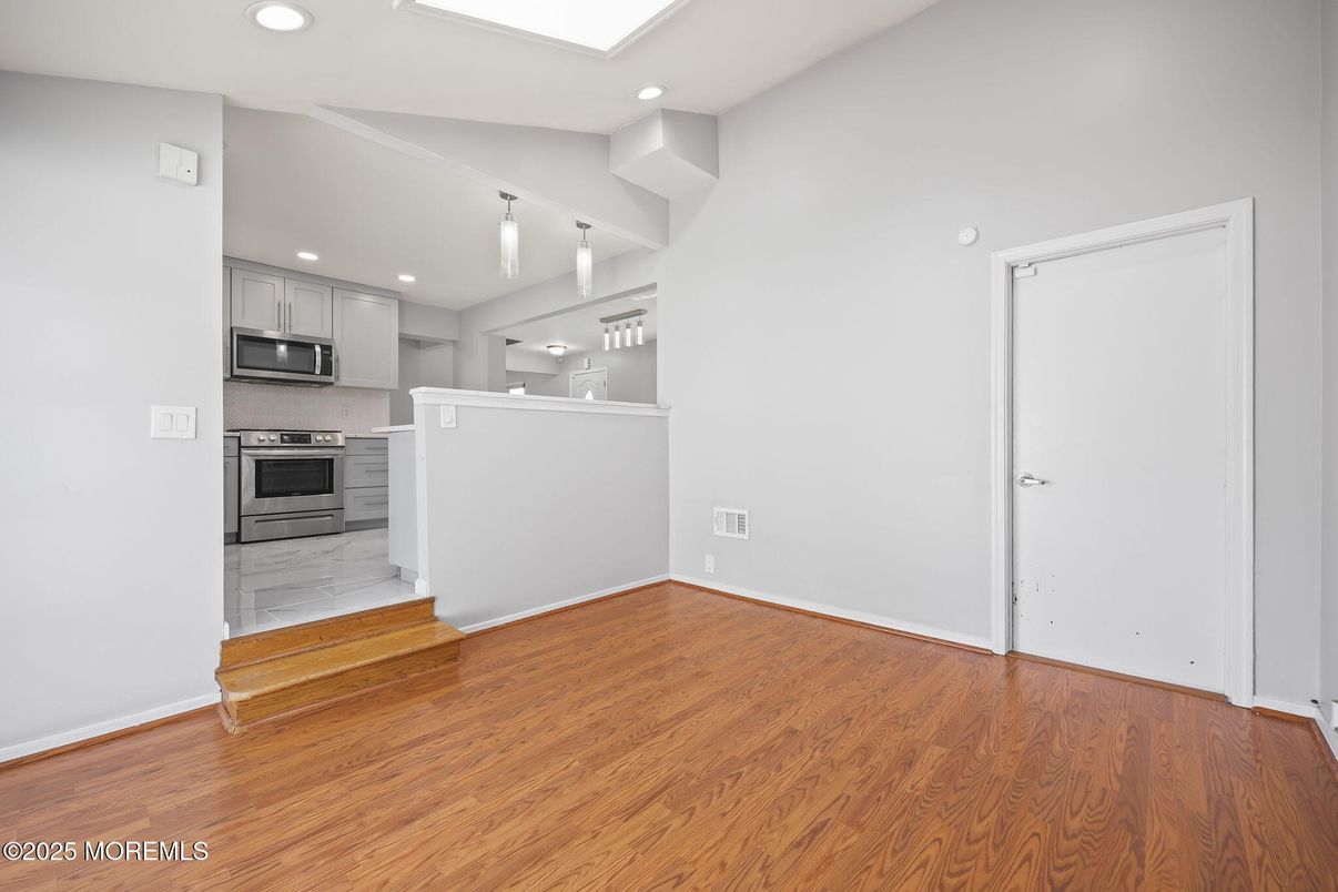Interior, Kitchen, Marble, Pendant Lights, Recessed Lighting, Stainless Steel Appliances, Wood Texture Flooring