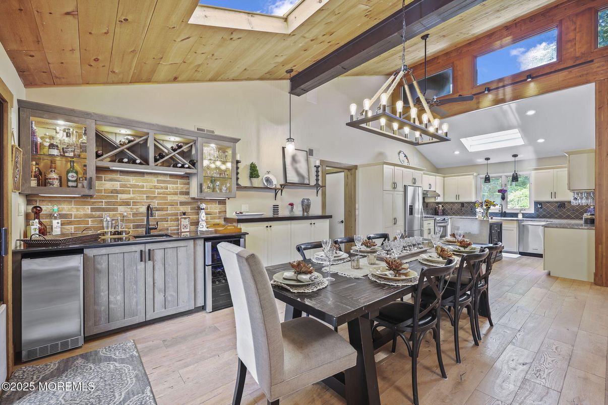 Dining room, Interior, Kitchen, Pendant Lights, Recessed Lighting, Stainless Steel Appliances, Stone Walls, Wooden Beams, Wooden Ceilings, Wood Texture Flooring