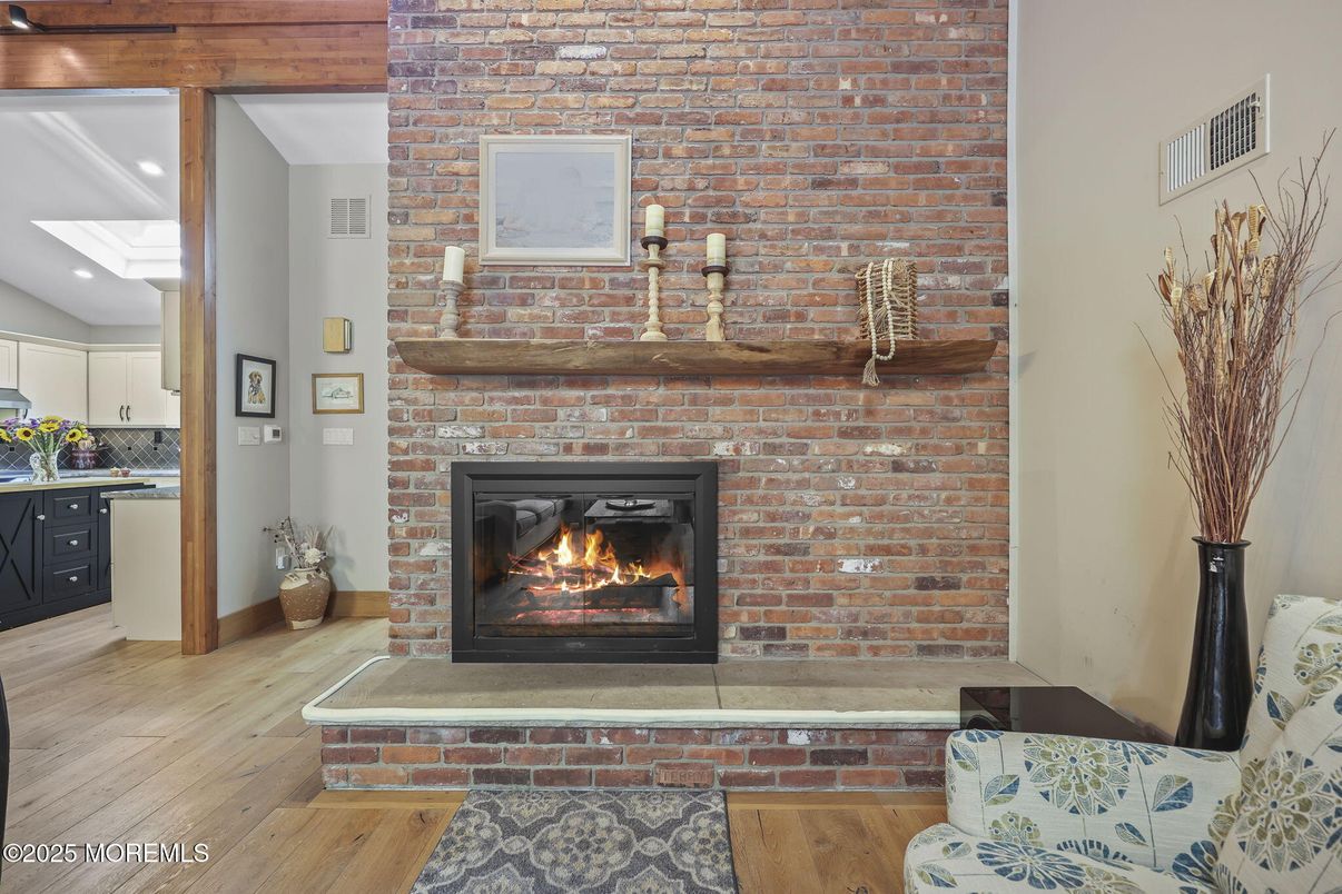 Fireplace, Interior, Kitchen, Recessed Lighting, Stone Walls, Wood Texture Flooring