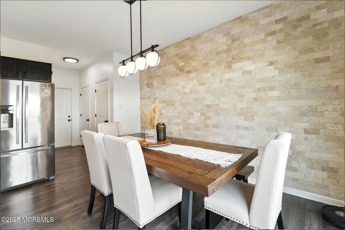 Dining room, Interior, Kitchen, Pendant Lights, Recessed Lighting, Stainless Steel Appliances, Stone Walls, Wood Texture Flooring