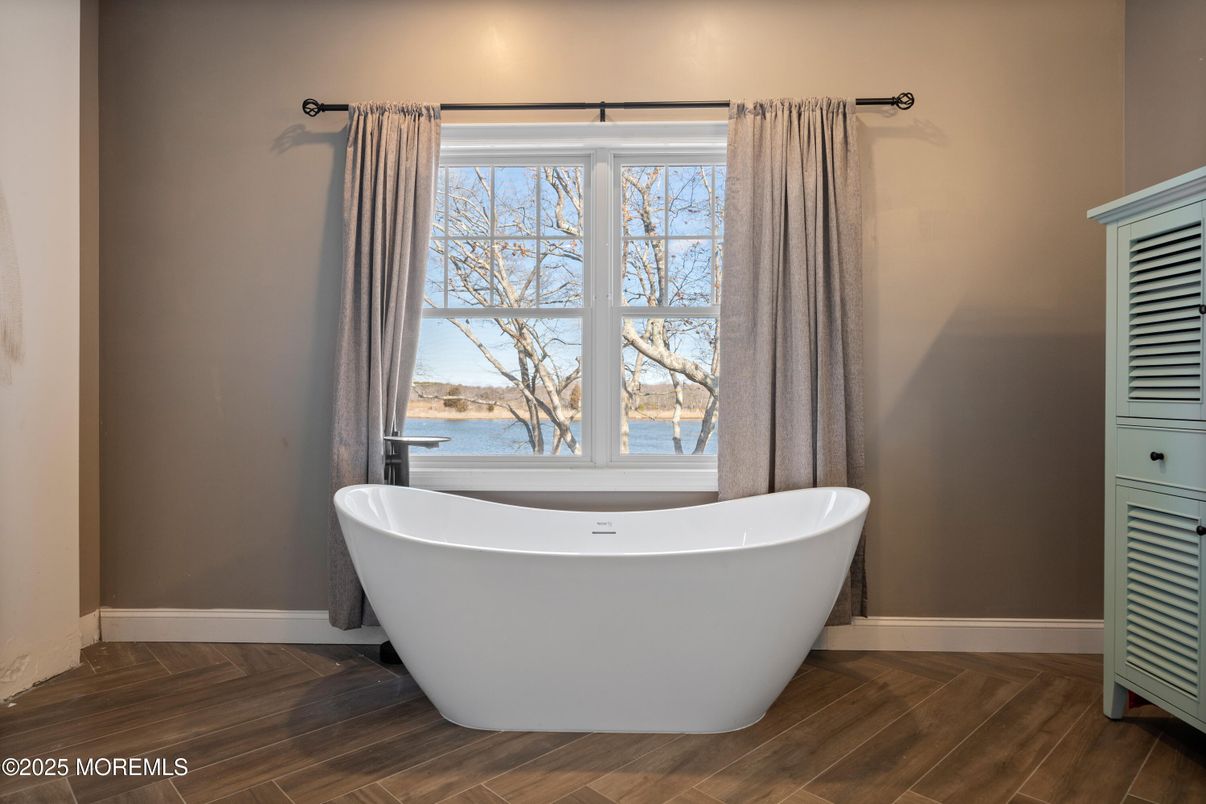 Bathroom, Free Standing Baths, Interior, Water, Wood Texture Flooring