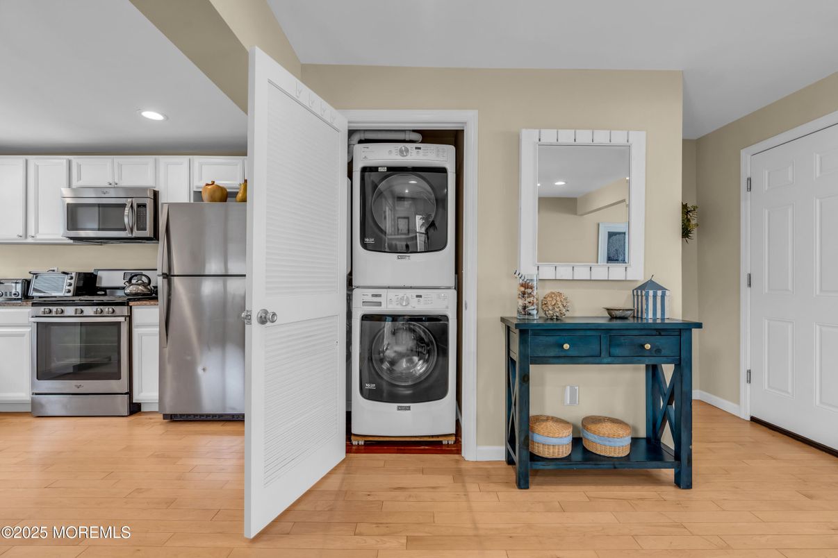 Interior, Kitchen, Recessed Lighting, Stainless Steel Appliances, Utility Closets, Washer, Wood Texture Flooring