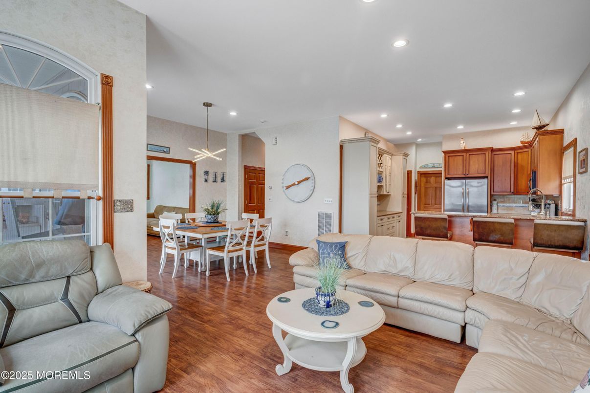 Dining room, Interior, Kitchen, Living room, Pendant Lights, Recessed Lighting, Stainless Steel Appliances, Wood Texture Flooring