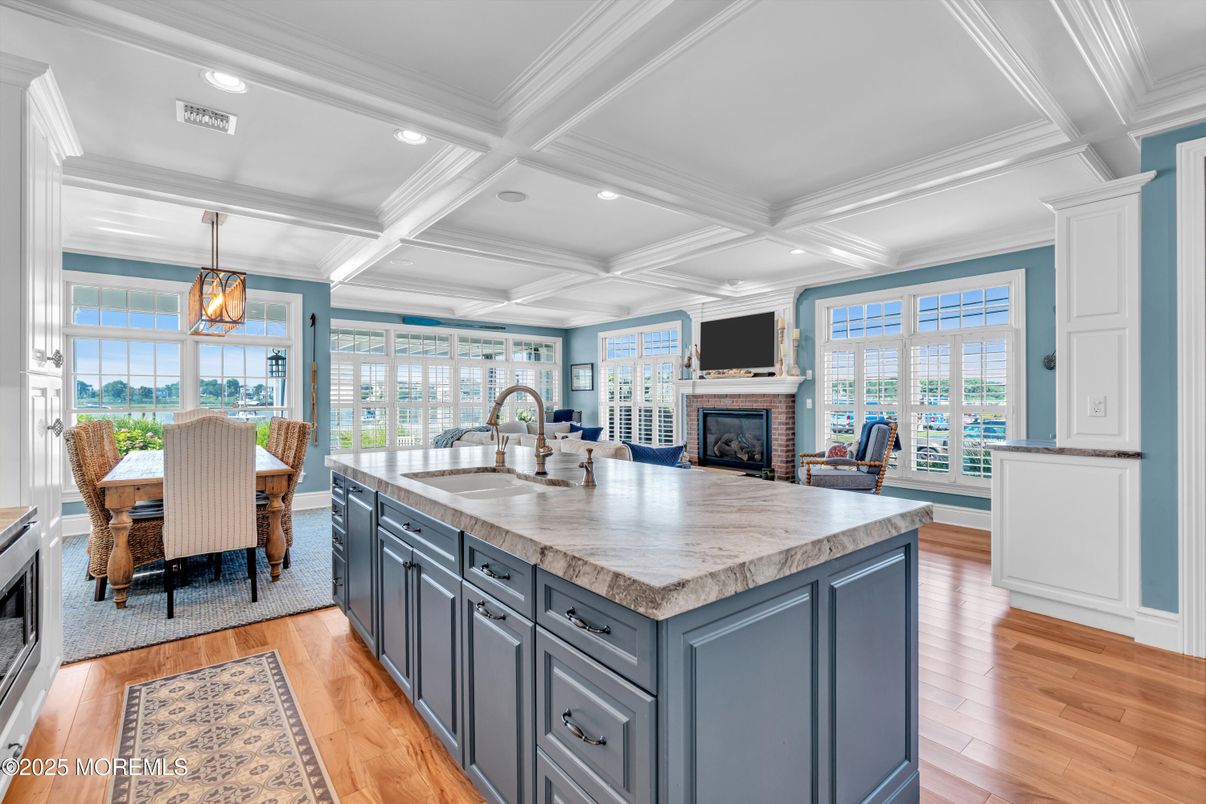 Dining room, Fireplace, Interior, Kitchen, Pendant Lights, Recessed Lighting, Wood Texture Flooring