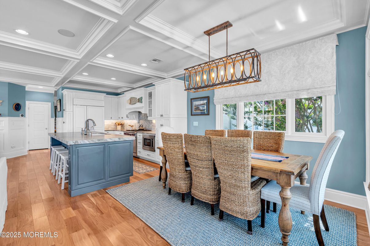 Chandelier, Dining room, Interior, Kitchen, Pendant Lights, Recessed Lighting, Stainless Steel Appliances, Wood Texture Flooring