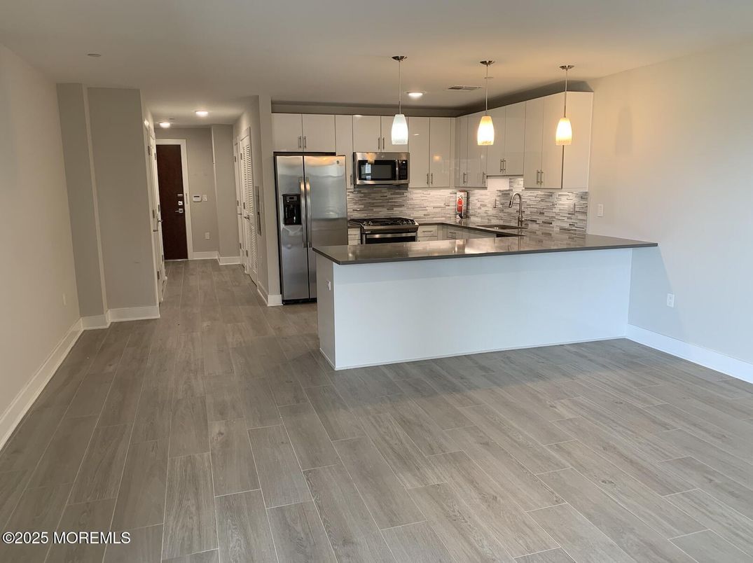 Interior, Kitchen, Pendant Lights, Recessed Lighting, Stainless Steel Appliances, Wood Texture Flooring