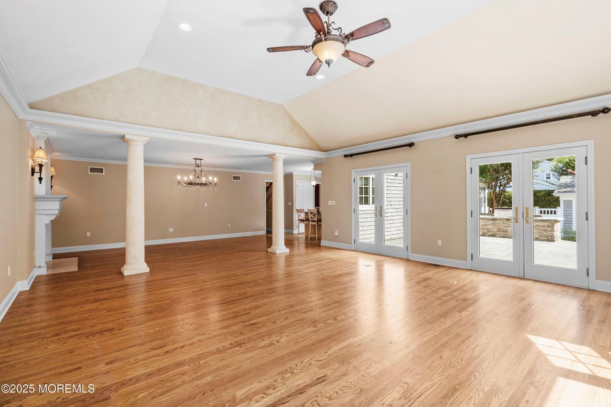 Chandelier, Empty room, Fireplace, Interior, Recessed Lighting, Wood Texture Flooring