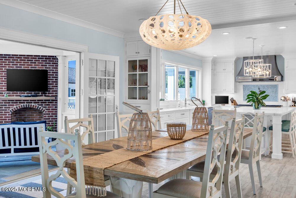 Dining room, Fireplace, Interior, Kitchen, Pendant Lights, Recessed Lighting, Stone Walls, Wood Texture Flooring