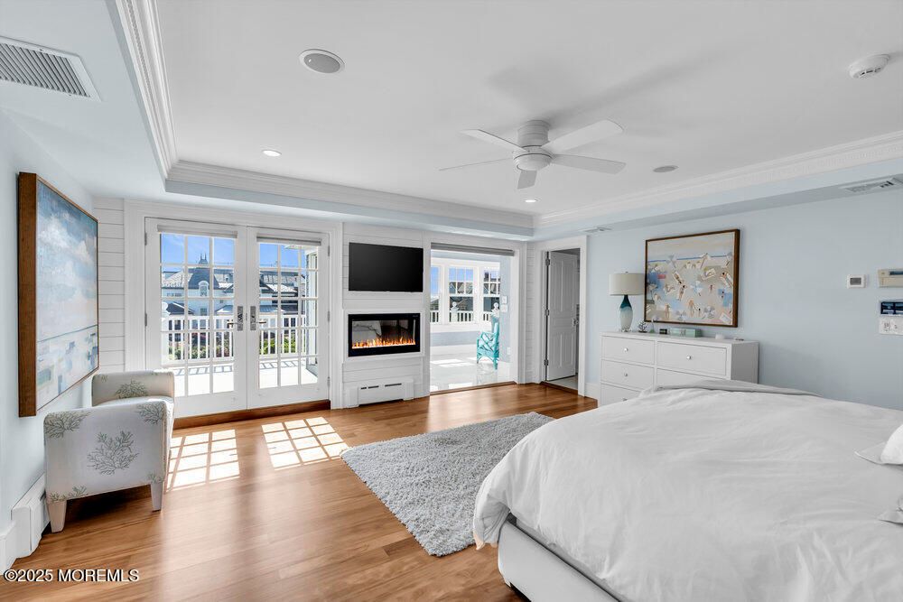 Bedroom, Fireplace, Interior, Recessed Lighting, Wood Texture Flooring