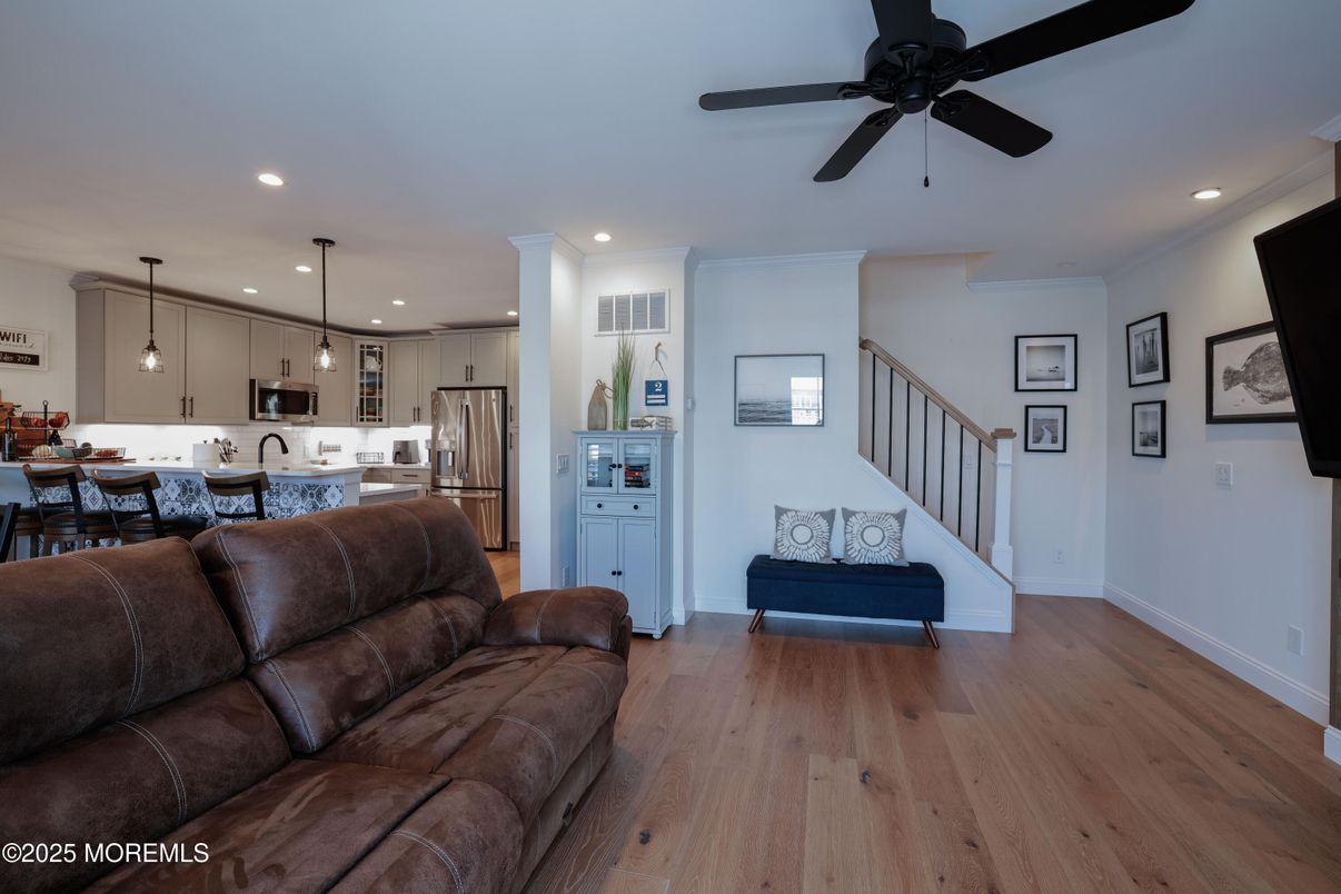 Dining room, Interior, Kitchen, Living room, Pendant Lights, Recessed Lighting, Stainless Steel Appliances, Wood Texture Flooring