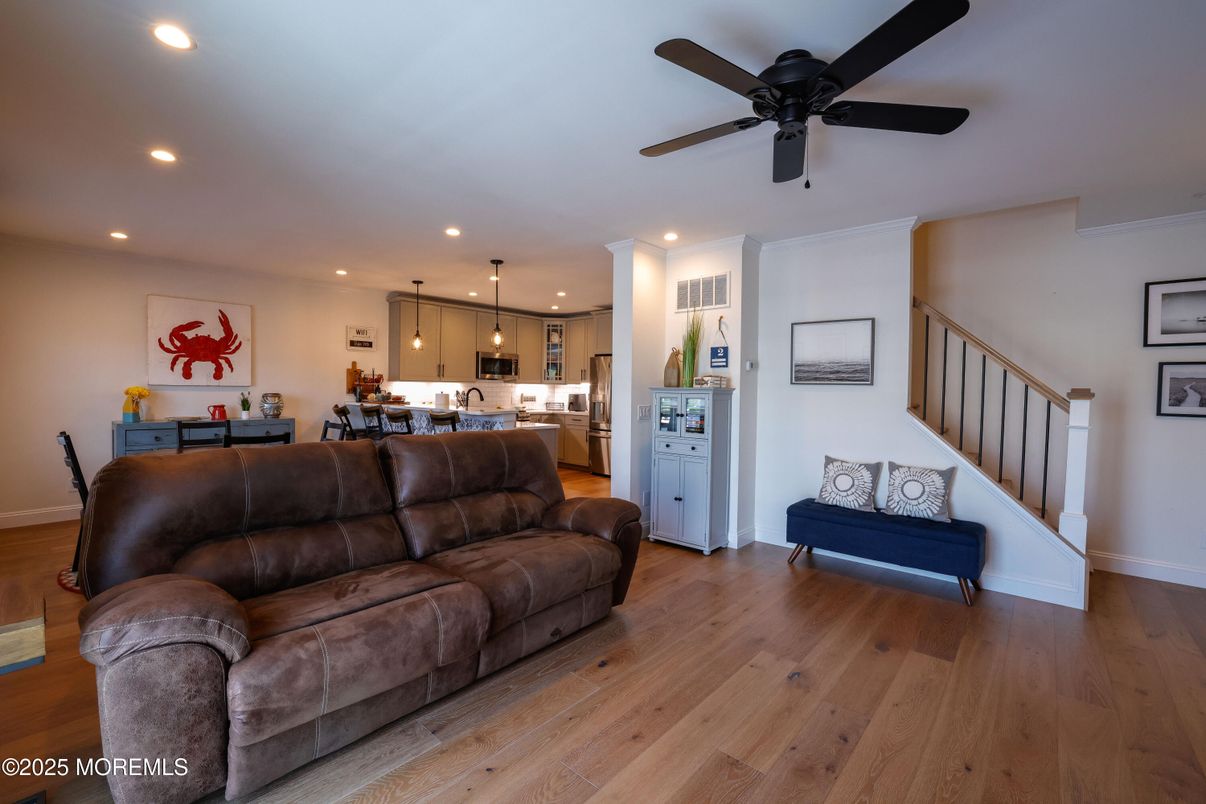 Dining room, Interior, Kitchen, Living room, Pendant Lights, Recessed Lighting, Stainless Steel Appliances, Wood Texture Flooring