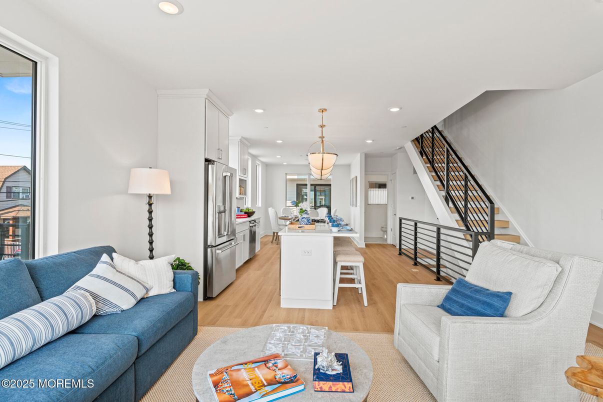 Dining room, Interior, Kitchen, Living room, Pendant Lights, Recessed Lighting, Stainless Steel Appliances, Wood Texture Flooring